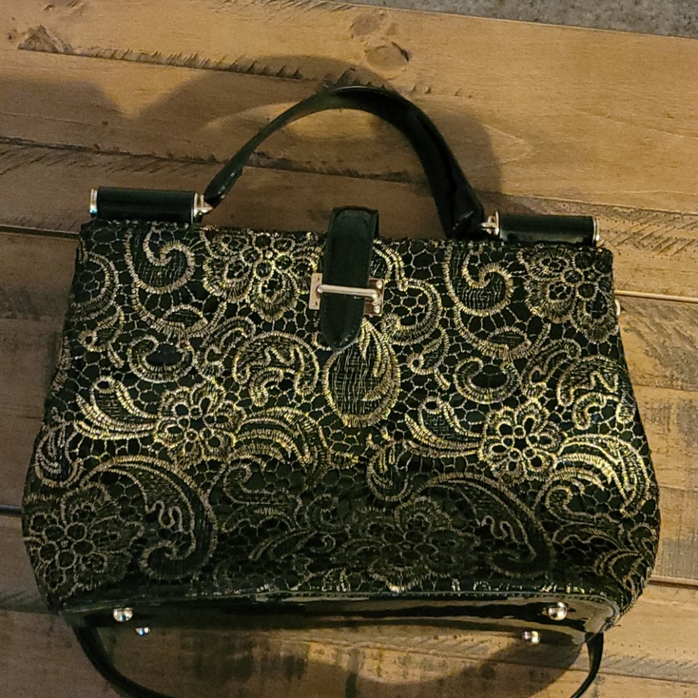 Black patent leather with gold lace trim purse